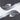 Close-up of the Luzz Swallow Glider 2026 paddle face edge featuring a white swallow graphic.